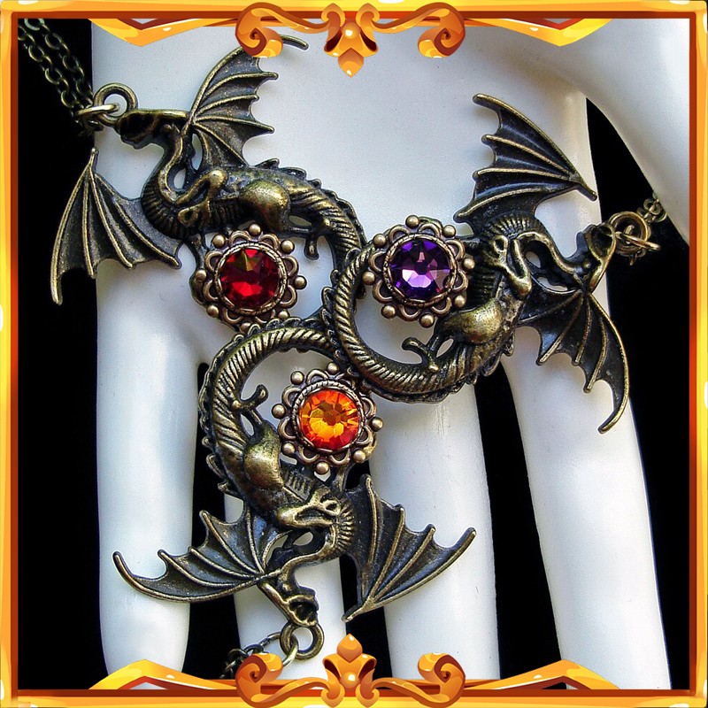 Collier pendentif dragon avec lame cachée