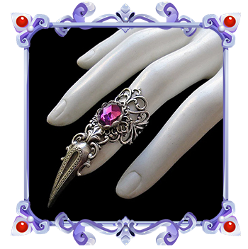 gothic claw ring with faceted purple crystal